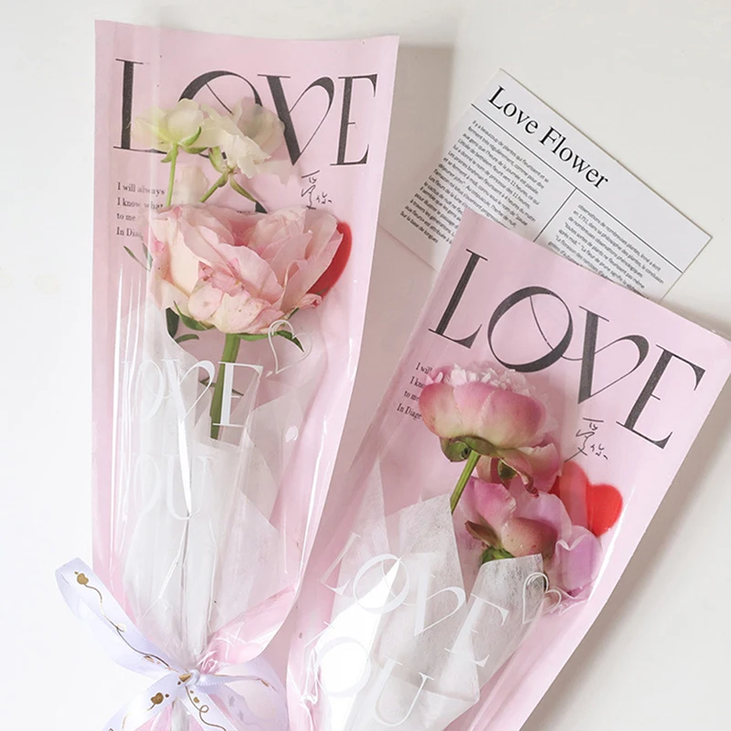 20 Stück LOVE Serie Transparente Rosen-Bedruckte Plastikverpackungsbeutel Blumenstrauß-Verpackung Einweg-Beutel für Geschenkartikel