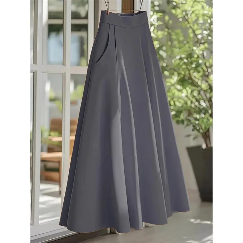 กระโปรงยาวทรงเอวสูงสีพื้นสำหรับผู้หญิงฤดูร้อน กระโปรงยาวลำลองสำหรับผู้หญิงระดับไฮเอนด์ แฟชั่นสไตล์ฝรั่งเศสปี 2025 กระโปรงยาวทรงแม็กซี่เนื้อบาง