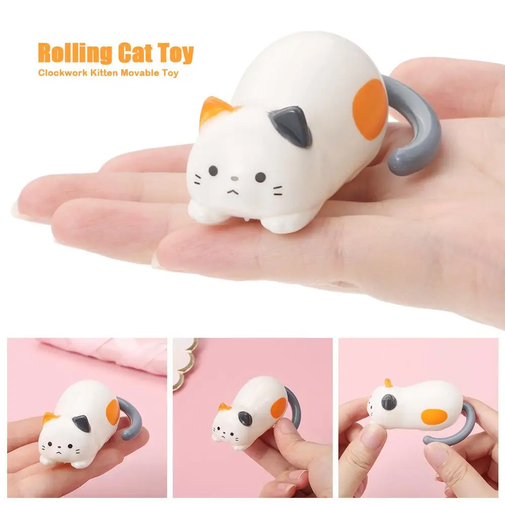 Novo bonito rolamento gato brinquedo alívio do estresse plástico relógio gatinho brinquedo móvel fidget brinquedo móvel ornamentos casa