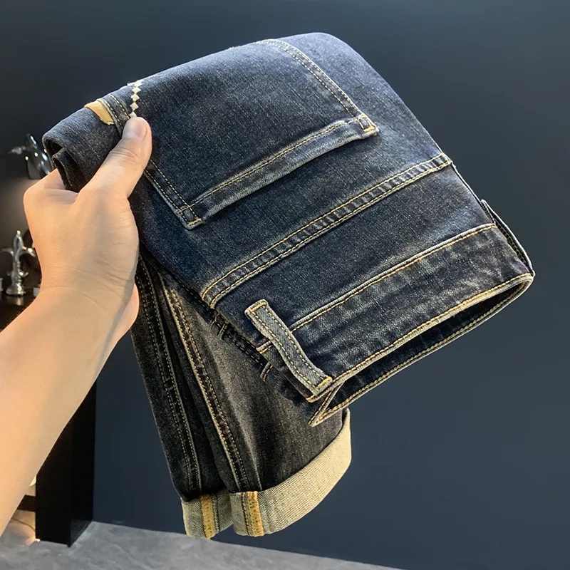 

2025 new blue tapered small leg jeans for men's autumn versatile fashion, high-end casual elastic slim fit pants