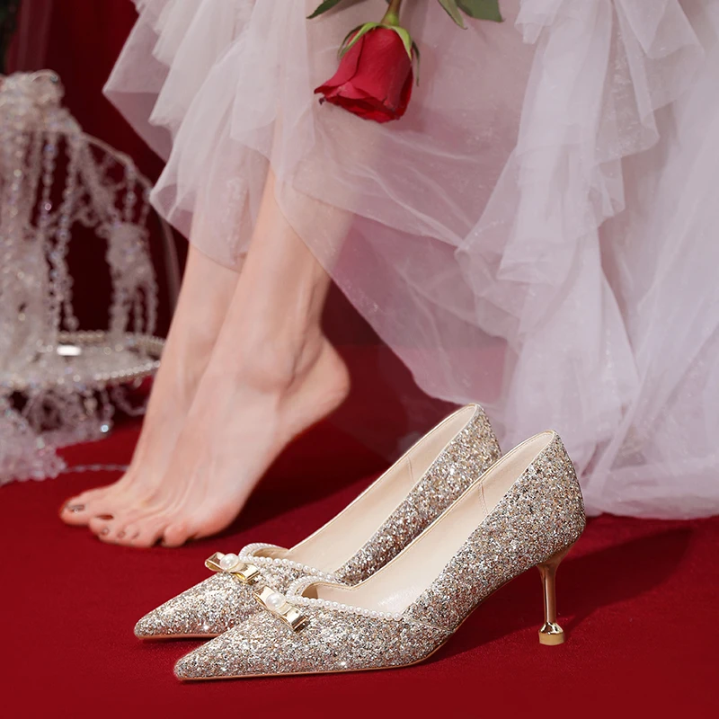 

Glass Slipper Wedding Shoes Women 2022 New Sequined Cloth Bride Dress Pumps Golen Stiletto High Heels Pearl Bowknot Single Shoes