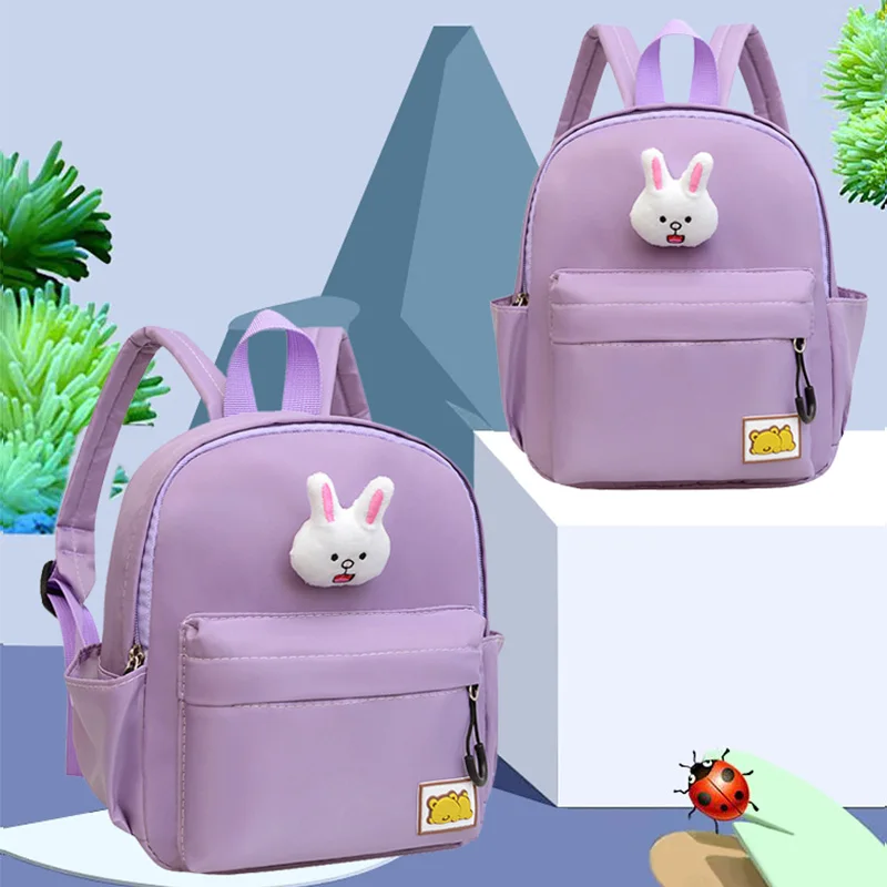 Mochila de estilo Simple para niños, bolso escolar ligero de nailon, resistente al agua, de colores sólidos, para guardería y viajes