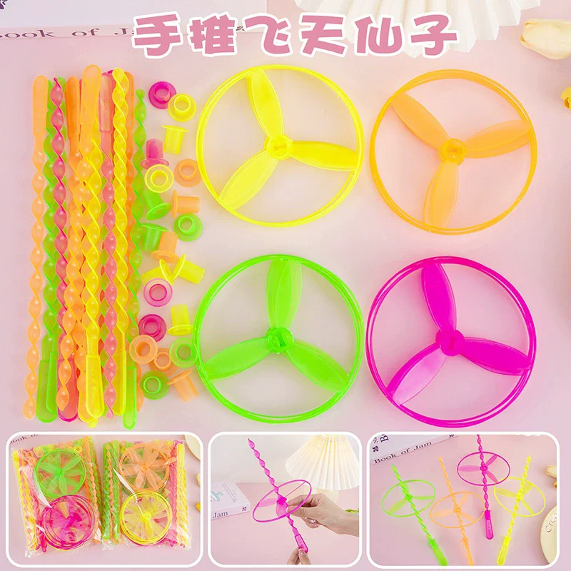 20 szt. Ręcznie pchane UFO, plastikowe obrotowe pierścienie latające, zabawki sportowe dla dzieci, prezenty dla uczniów, zabawki na zewnątrz dla dzieci