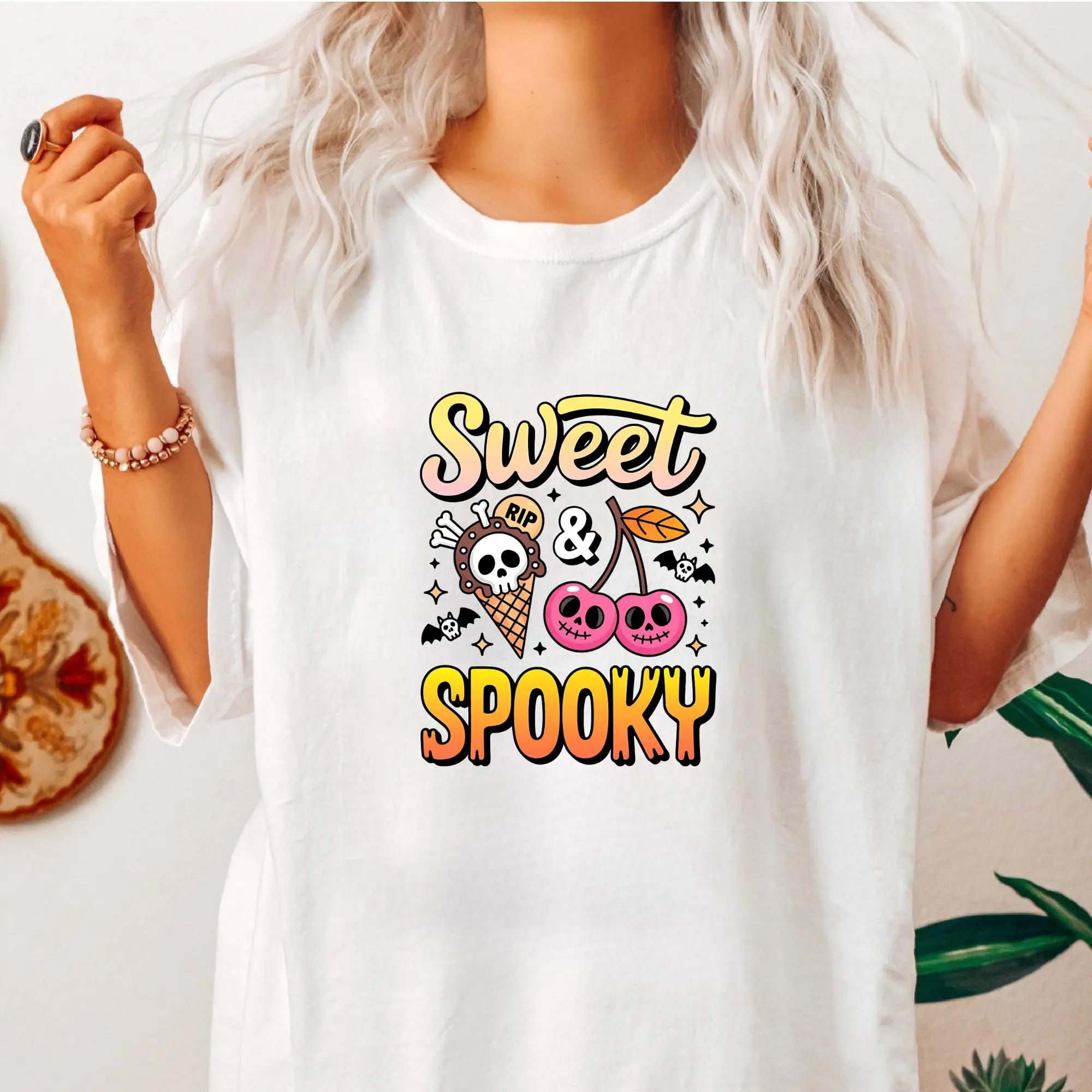

Adorable And Eerie T - Shirt With "Sweet & Spooky" Theme