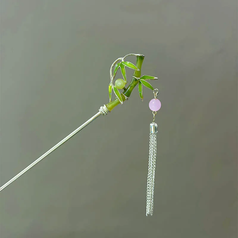 

Заколки для волос в древнем стиле из бамбука и листьев гинкго - это высококачественные спиральные заколки для женщин, простые и универсальные.