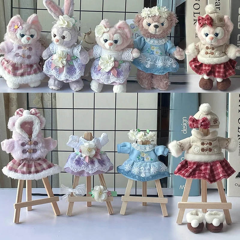 ตุ๊กตาสติทช์ขนาด 10 ซม. พร้อมเสื้อผ้า จี้ห้อยน่ารัก การ์ตูน ตุ๊กตาผ้าพลัฌ คุโรมิ พวงกุญแจ เสื้อคลุม หูฟัง อุปกรณ์เสริมตุ๊กตา ของขวัญสำหรับเด็กผู้หญิง