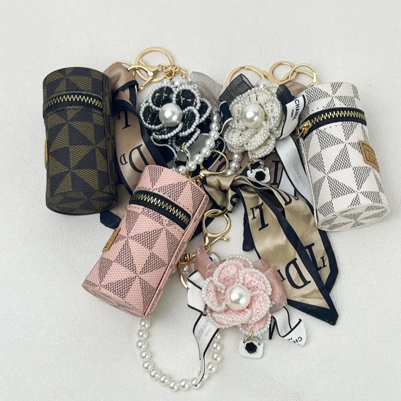 Original new small bag pendant camellia bow bag pendant keychain fashion pearl chain European and American presbyopic coin purse