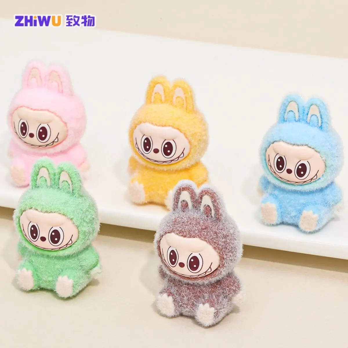 

5pcs Labubu 4cm Cute Grains Flocking Sitting Doll Cute Pendant DIY Decoration Accessories Cartoon Desktop Ornament Gift