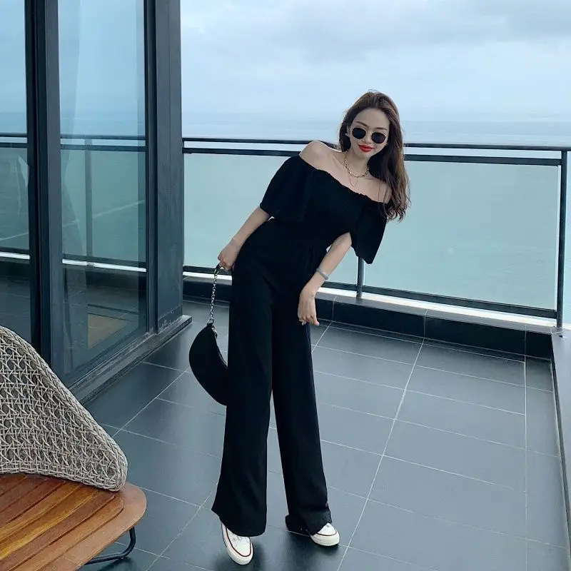 Tute a maniche corte con spalle scoperte Tute da donna eleganti con pieghe in vita Tuta dritta da donna con scollo quadrato senza schienale Estate nuova