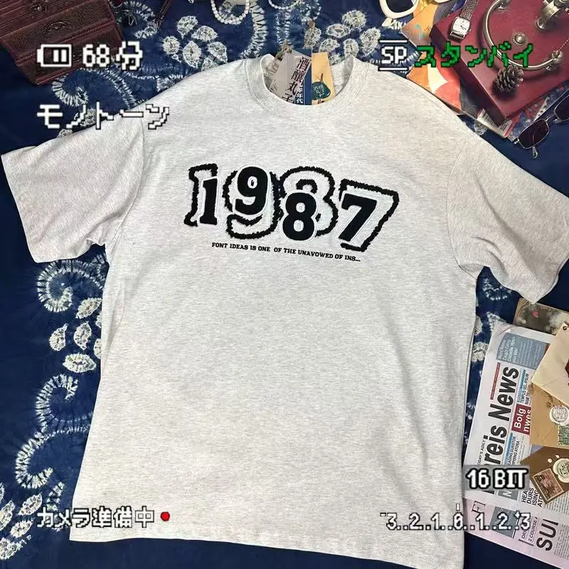 2025 جديد الأمريكية الرجعية هونغ كونغ نمط منشفة التطريز زوجين التي شيرت المرأة Ins قصيرة الأكمام عادية الكورية موضة تي شيرت