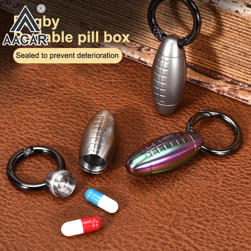 

Cool Rugby Shaped Sealed Jar Stainless Steel Waterproof Mini Sealed Can Pill Portable Container Sealed Can With Keychain