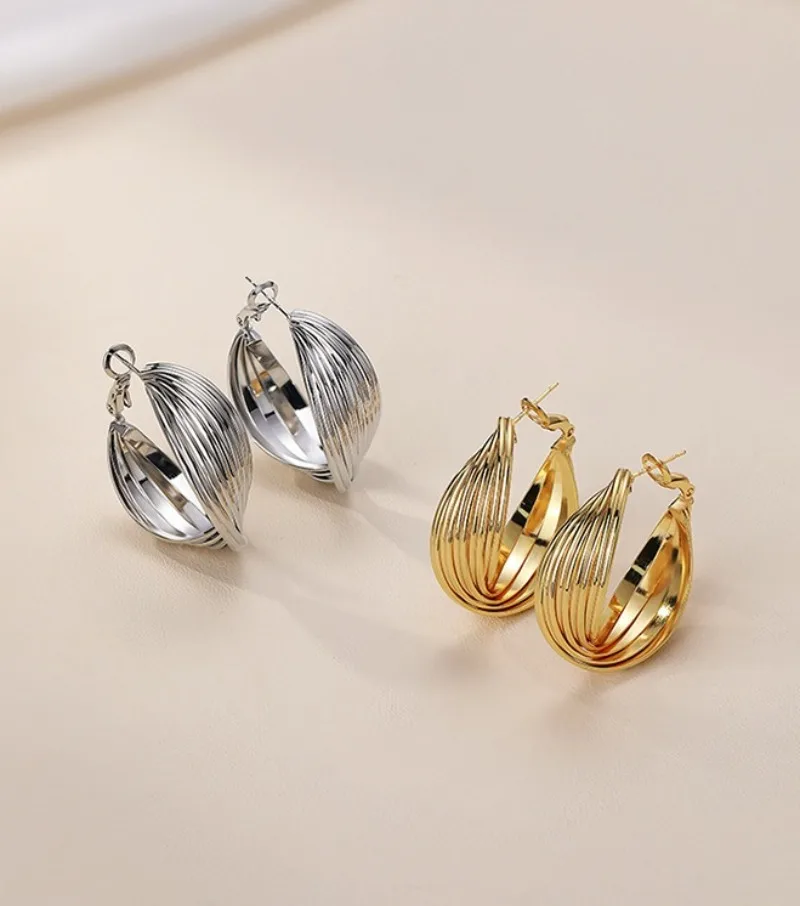 Retro Luxe Mobius‑Loop Earrings for Women, High‑End Stylish Ear Ornaments, Perfect for Casual Outfits & Party Occasions