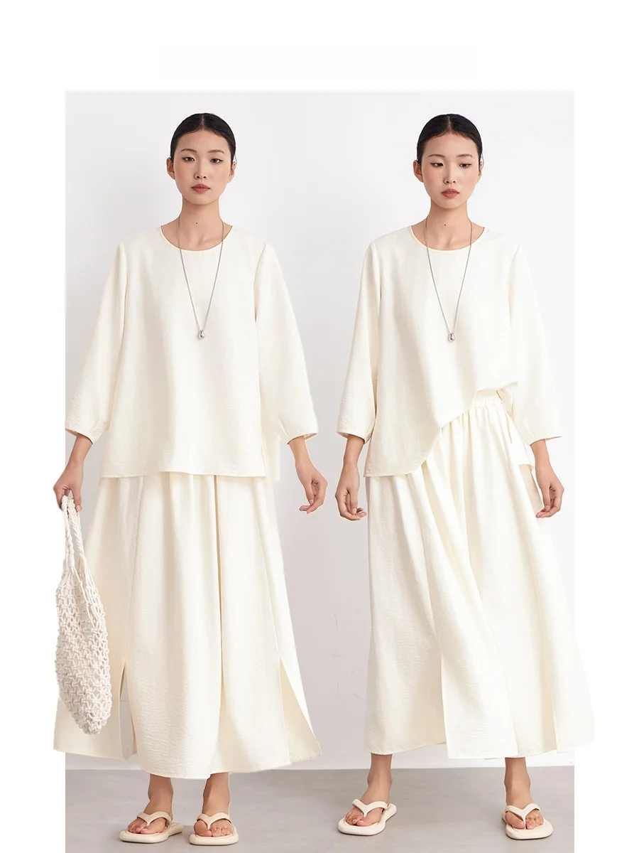 Taille élastique jupe asymétrique femmes Texture douce grande jupe printemps été nouveau Sle décontracté confortable jupe trapèze