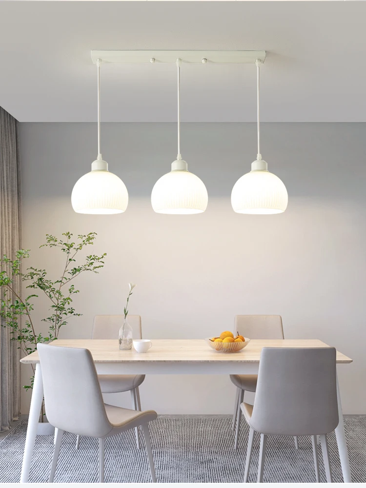 Restaurant pendant light is simple, modern, creative, and minimalist. White shop bar table light is Nordic cream and silent wind