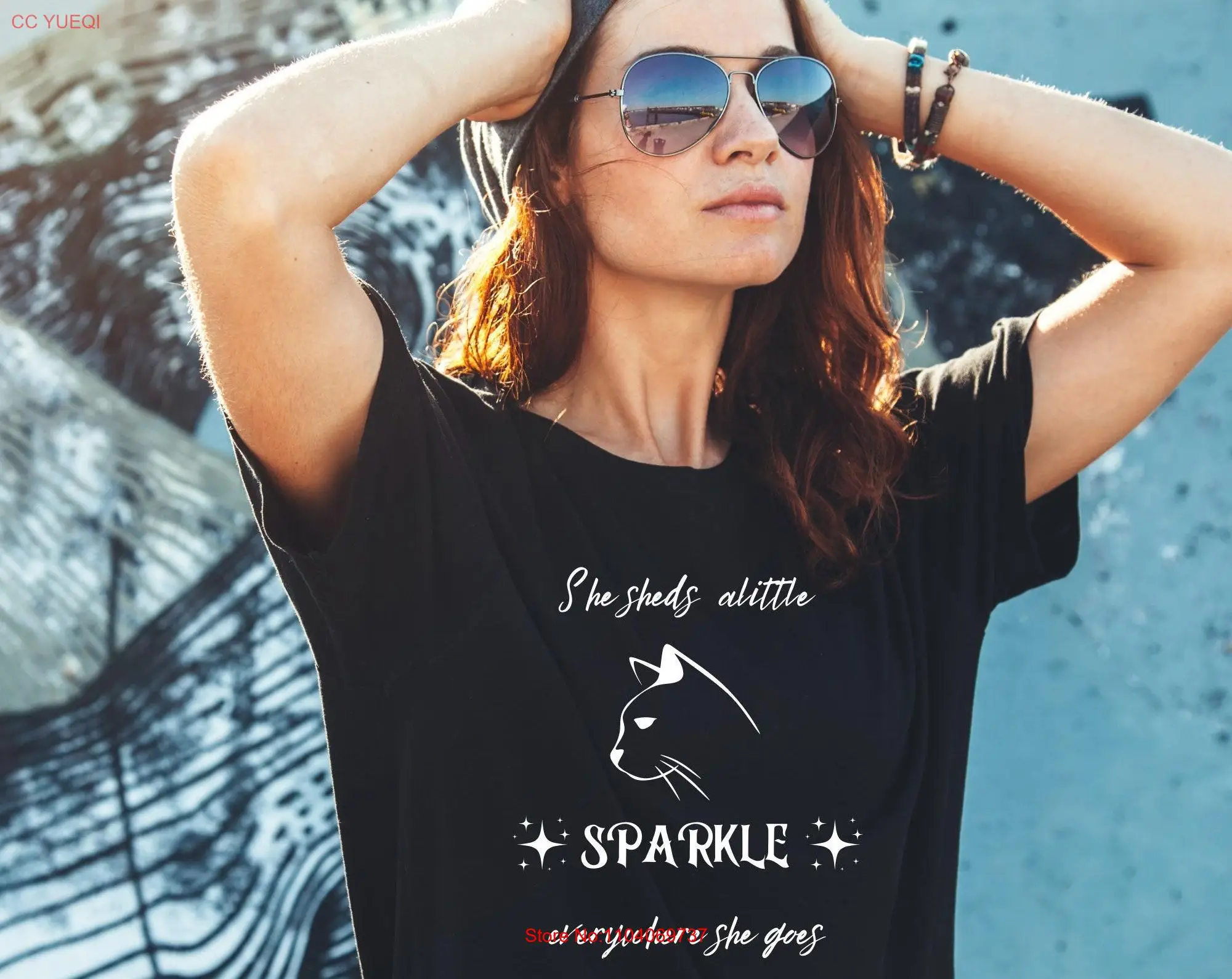 She sheds alittle sparkle everywhere goes caT T Shirt Women's men's gift for her Jersey  long or short sleeves