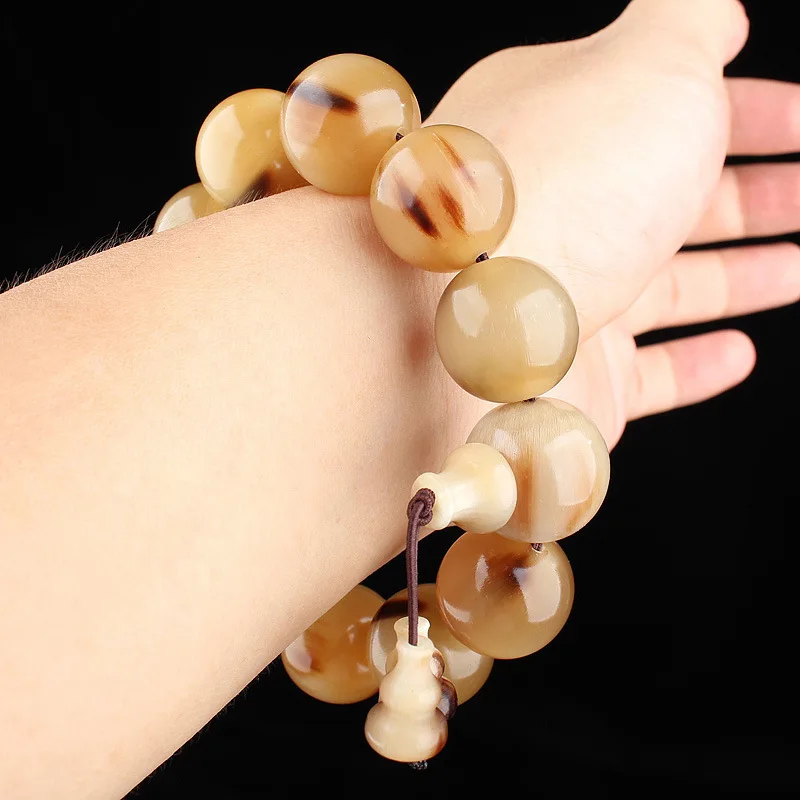 - yak horn bracelet, authentic cultural artifact, cow bone hand-held Buddhist beads, white buffalo Tibetan-style bra