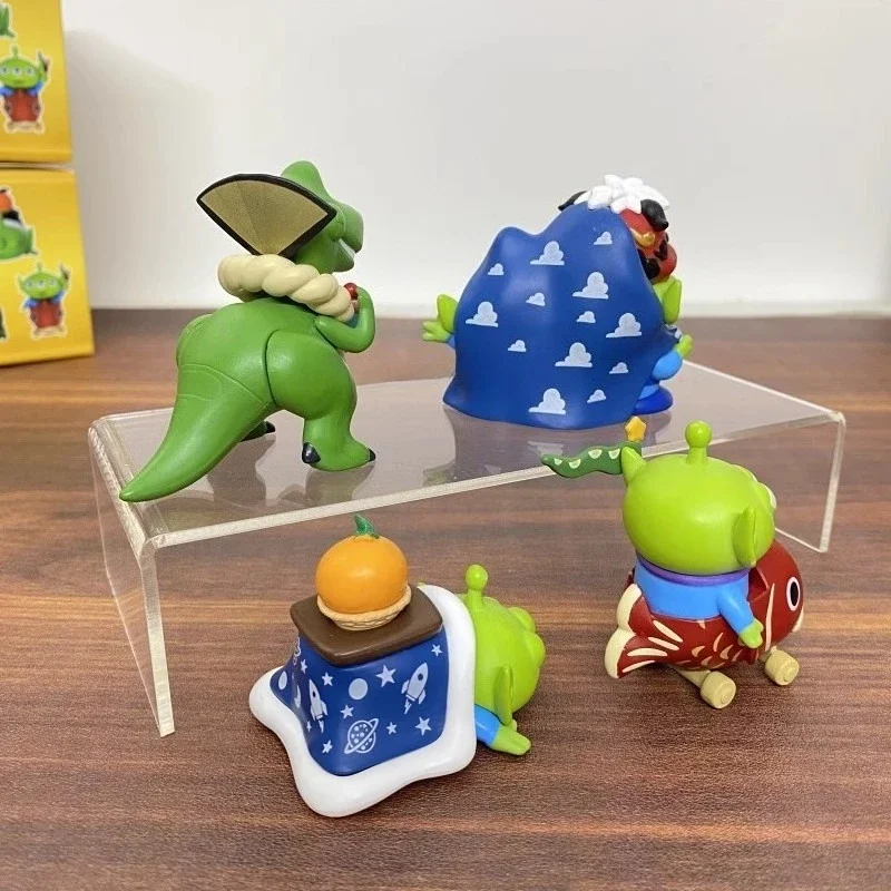 4.5-6 ซม.4 ชิ้น/เซ็ต Toy Story Alien Rex กอดมังกรเครื่องประดับน่ารักอุปกรณ์ต่อพ่วงภาพยนตร์ตุ๊กตาตกแต่งบ้านเดสก์ท็อปเครื่องประดับของขวัญ