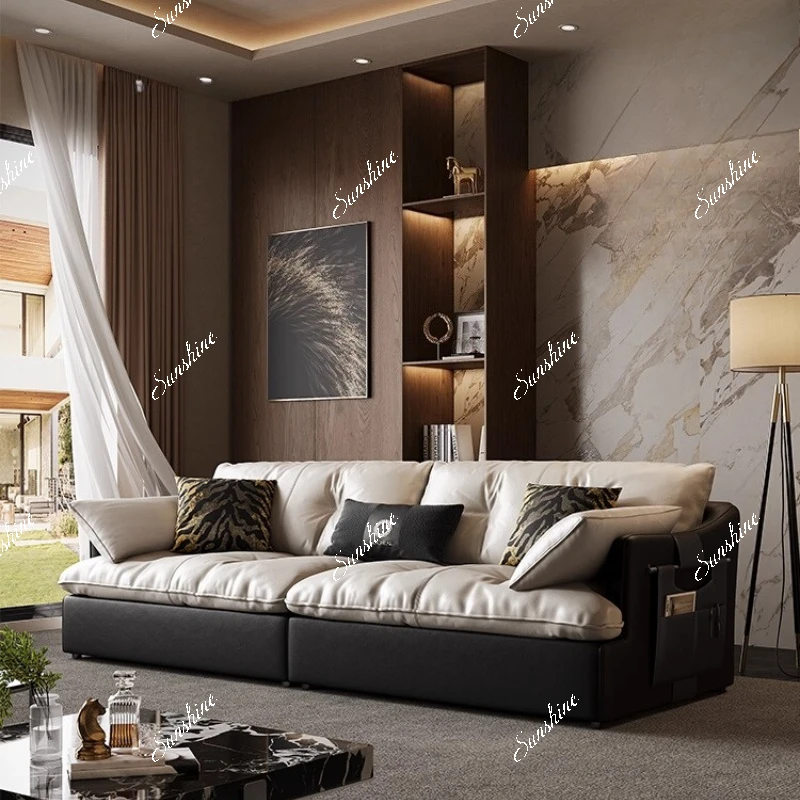 

The sofa is all leather, the large flat-floor living room is simple and modern, and the straight row color matching is high-end.