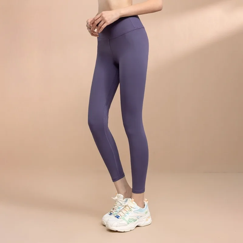 Bezszwowe spodnie fitness bez śladów, efekt \"nagiej skóry\", wysoki stan, modelujące pośladki, sportowe, wysoka elastyczność, podnoszące biodra, oddychające, szybkoschnące.