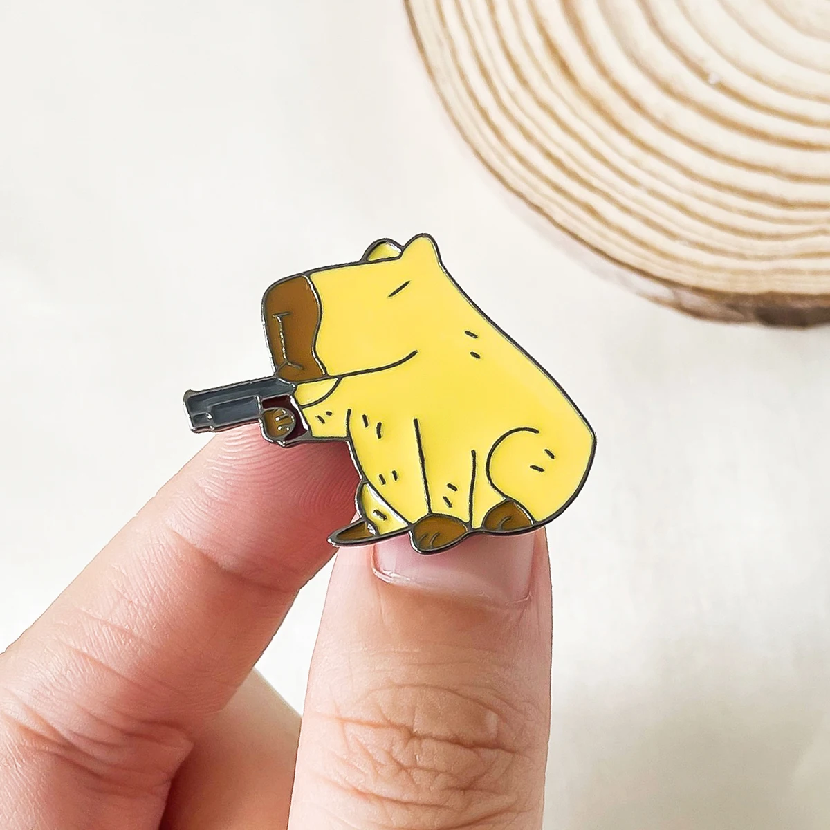 Medosor Funny Capybara Holding Gun Brooch Enamel Cartoon Pin Lapel Backpack Badge Cute Gifts for Friends Students Collections