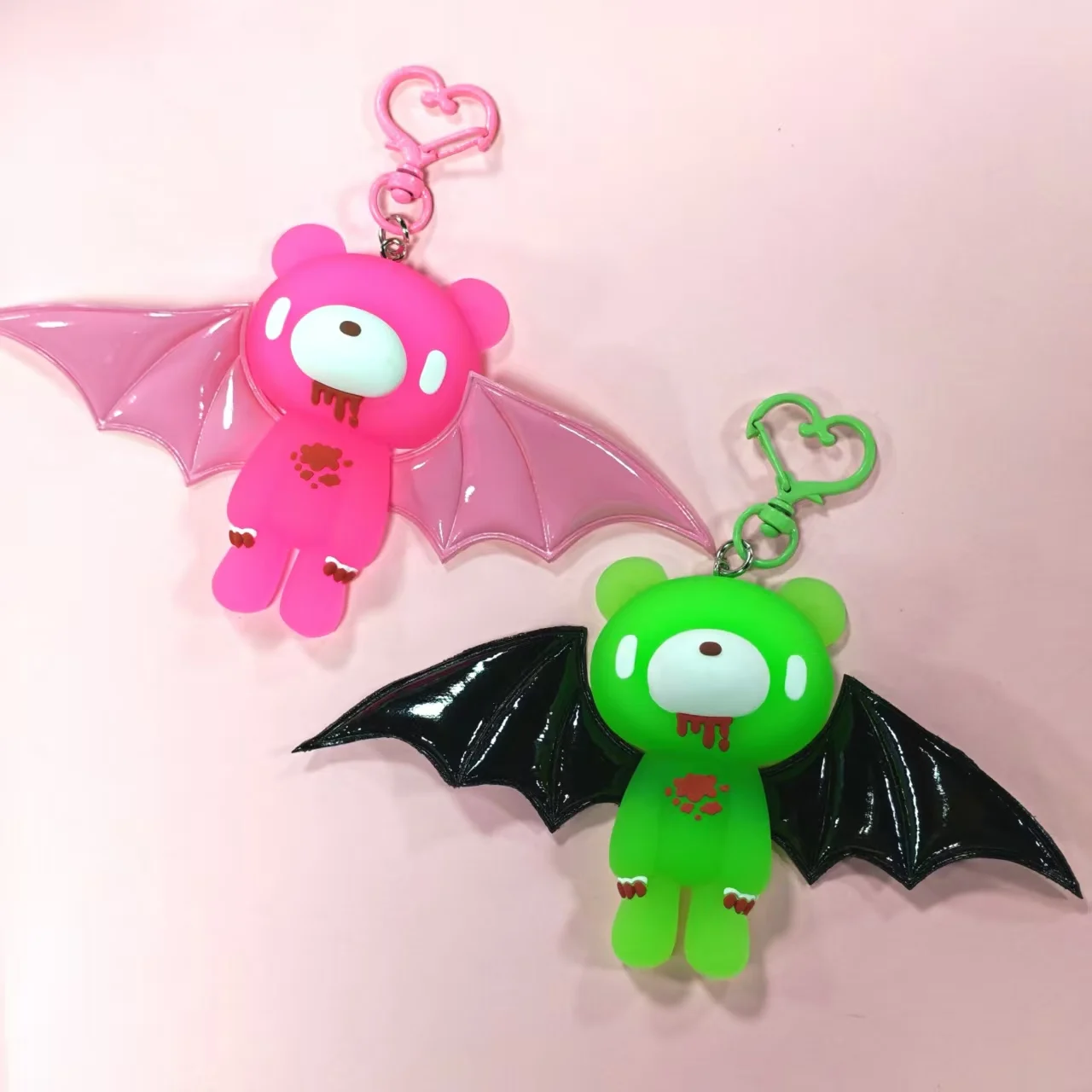 These cute bear keychains with bat wings are awesome! In colors like black, pink, white, and green,  perfect for keys or  bags