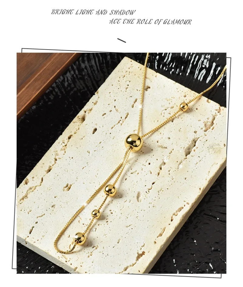 القلادة الطويلة القابلة للسحب من الفولاذ التيتانيوم هي نمط جديد للنساء في الخريف والشتاء، قلادة عصرية ومتعددة الاستخدامات