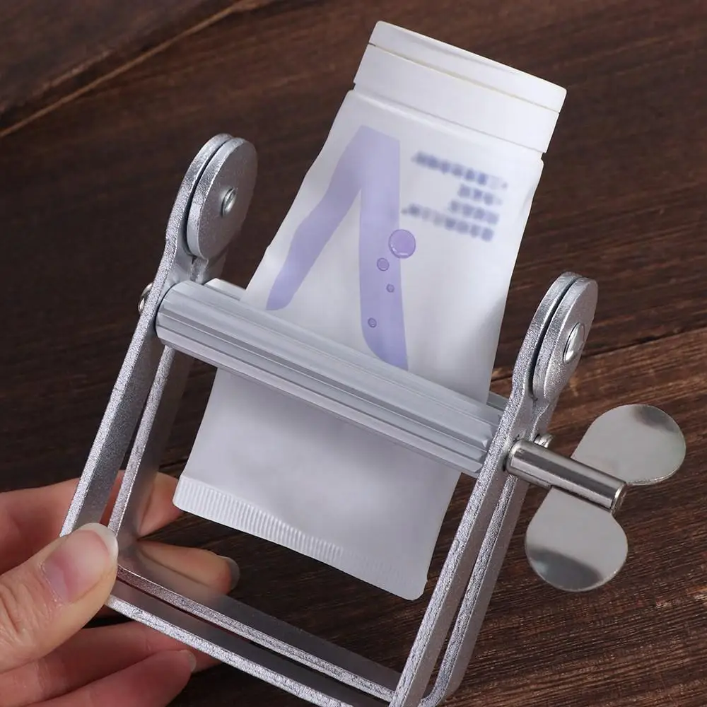 

Mini Rolling Toothpaste Squeezer Aluminum Squeezing Tool Tooth Paste Dispenser Silver Tightener Tube Wringer Household