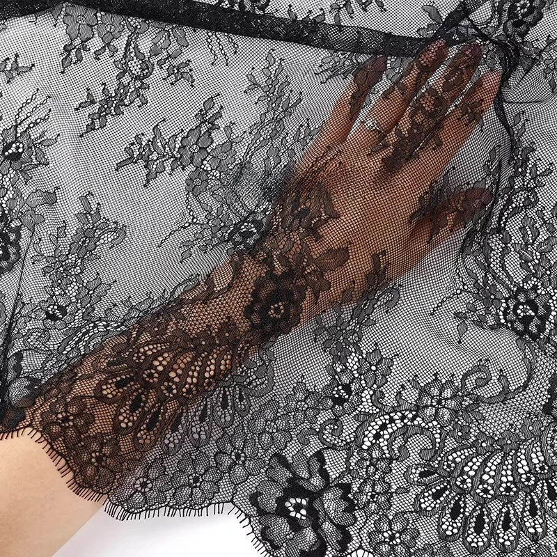 Soft, thin and comfortable black and white French wide edge lace, suitable for wedding dresses, tablecloths and curtain fabrics.