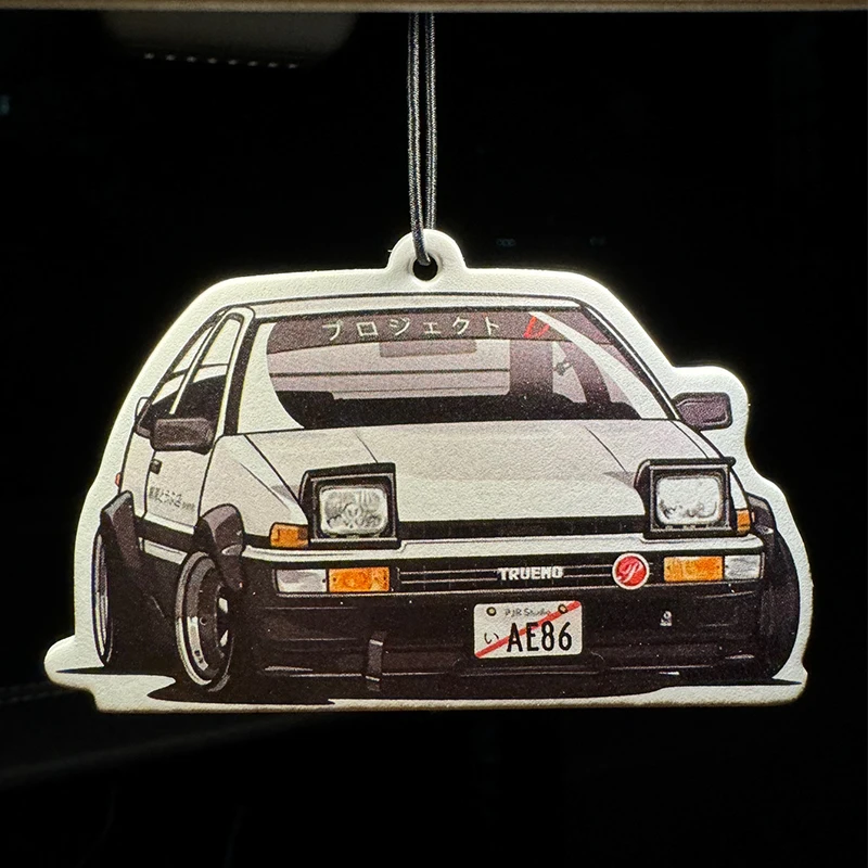 Japanese Racing Anime-Style Tofu Shop Racing Hilton (Hotel Scent) Neutral Car Perfume and Non-Toxic Air Freshener |   Natural Essential Oils and Aromatherapy Scent Tablets (Noroili/Grapefruit/Cedar) |   Hanging Type and Dual-Purpose with Vent Clip |   Long-Lasting Fragrance for 60-90 Days |   Deodorize and Purify the Air |   Suitable for Use in Cars, Homes, Wardrobes, and Bathrooms. |   Cartoon Animation Design |   Same Model as in the Store