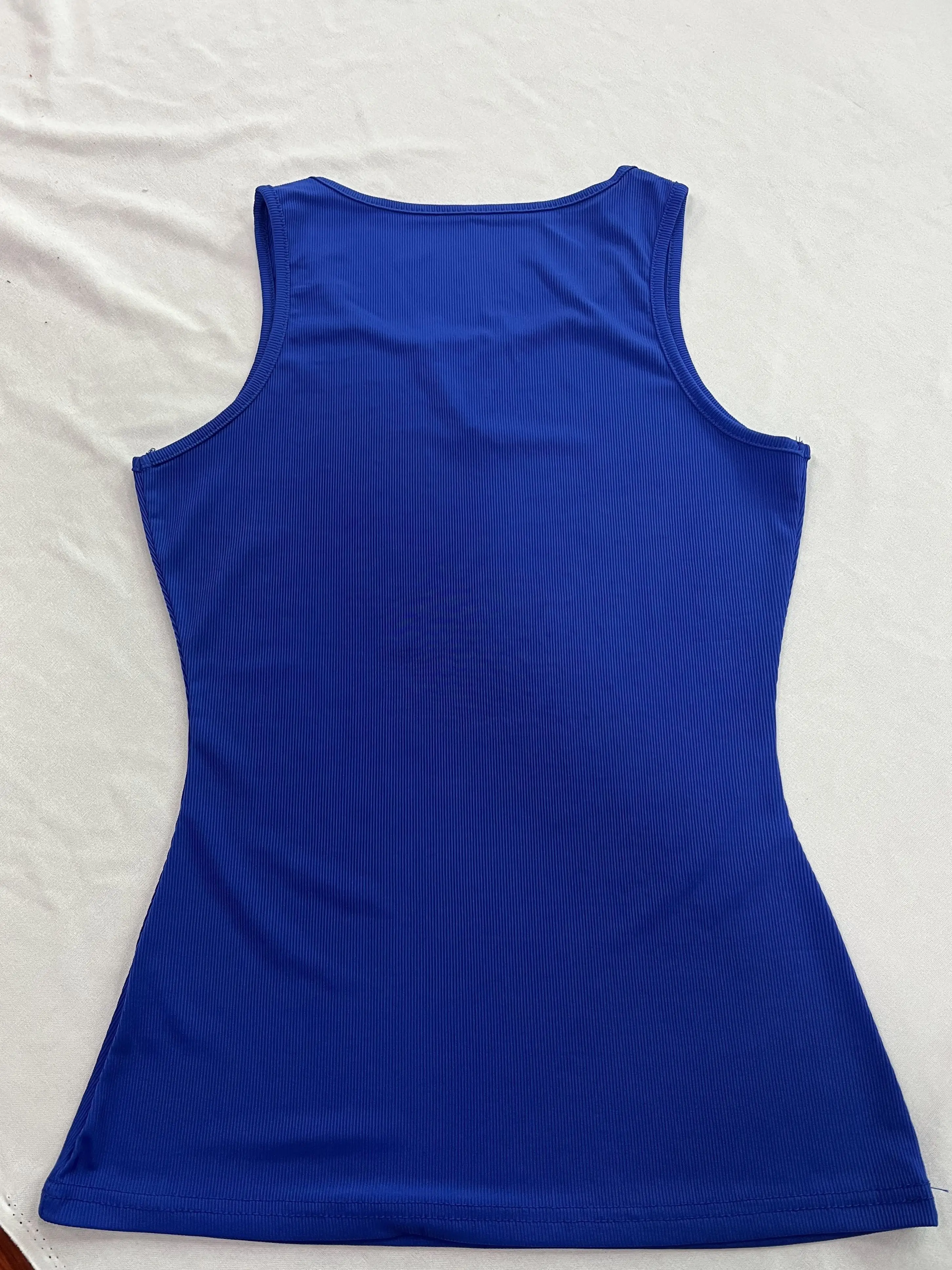 Versatile, fashionable, solid color, sexy V-neck vest with a herringbone women\'s top underneath