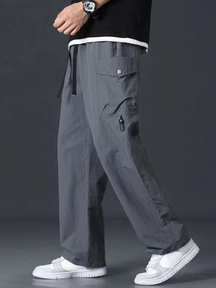 Męskie spodnie oversize na wiosnę i lato, proste, czarne, w stylu koreańskim, nowość, estetyczne, tanie spodnie typu slacks, nylonowe spodnie cargo streetwearowe dla mężczyzn.