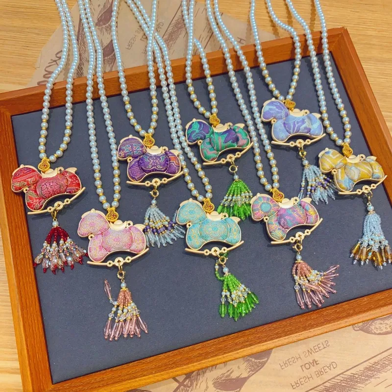 

New Chinese intangible cultural heritage Song Jin pony sweater chain money double-sided pearl necklace for the Year of the Horse