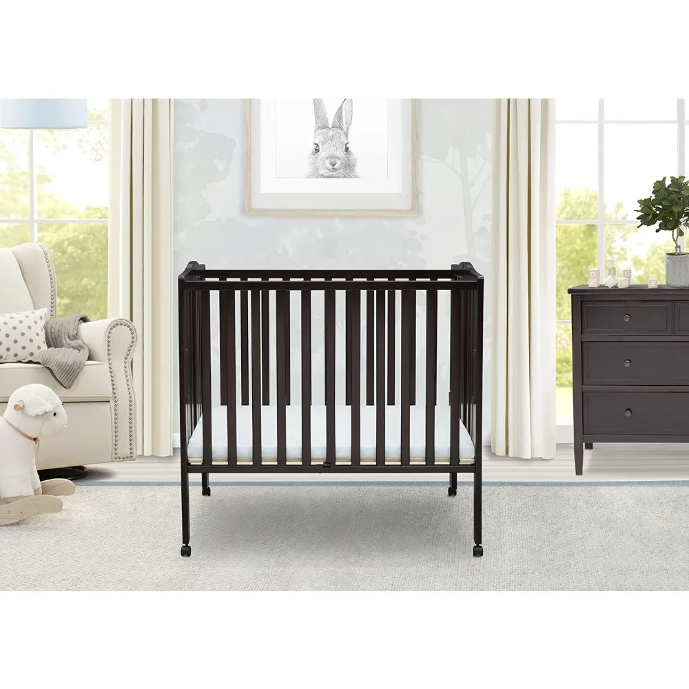 Delta Children Folding Portable Mini Baby Crib with 1.5-inch Mattress, Dark Chocolate