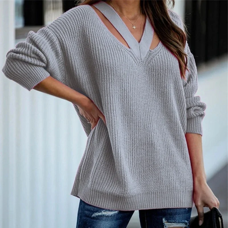 Eleganti maglioni lavorati a maglia in tinta unita da donna con scollo a v scava fuori pullover Casual allentati autunno inverno Street Fashion maglioni caldi