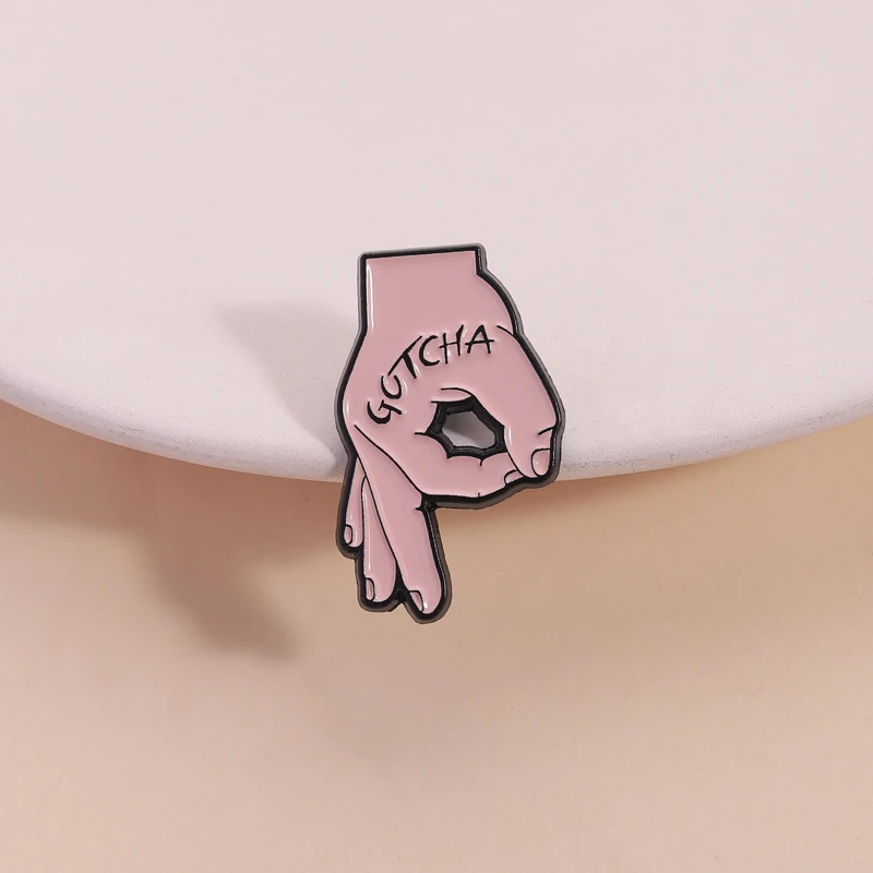 Funny Gesture Pin GOTCHA Text Hand Sign Design Playful Prank Novelty Brooch for Bag Jacket Backpack Decoration