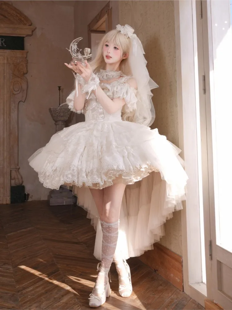 A white wedding dress with shorter front and longer back for students to graduate become adults