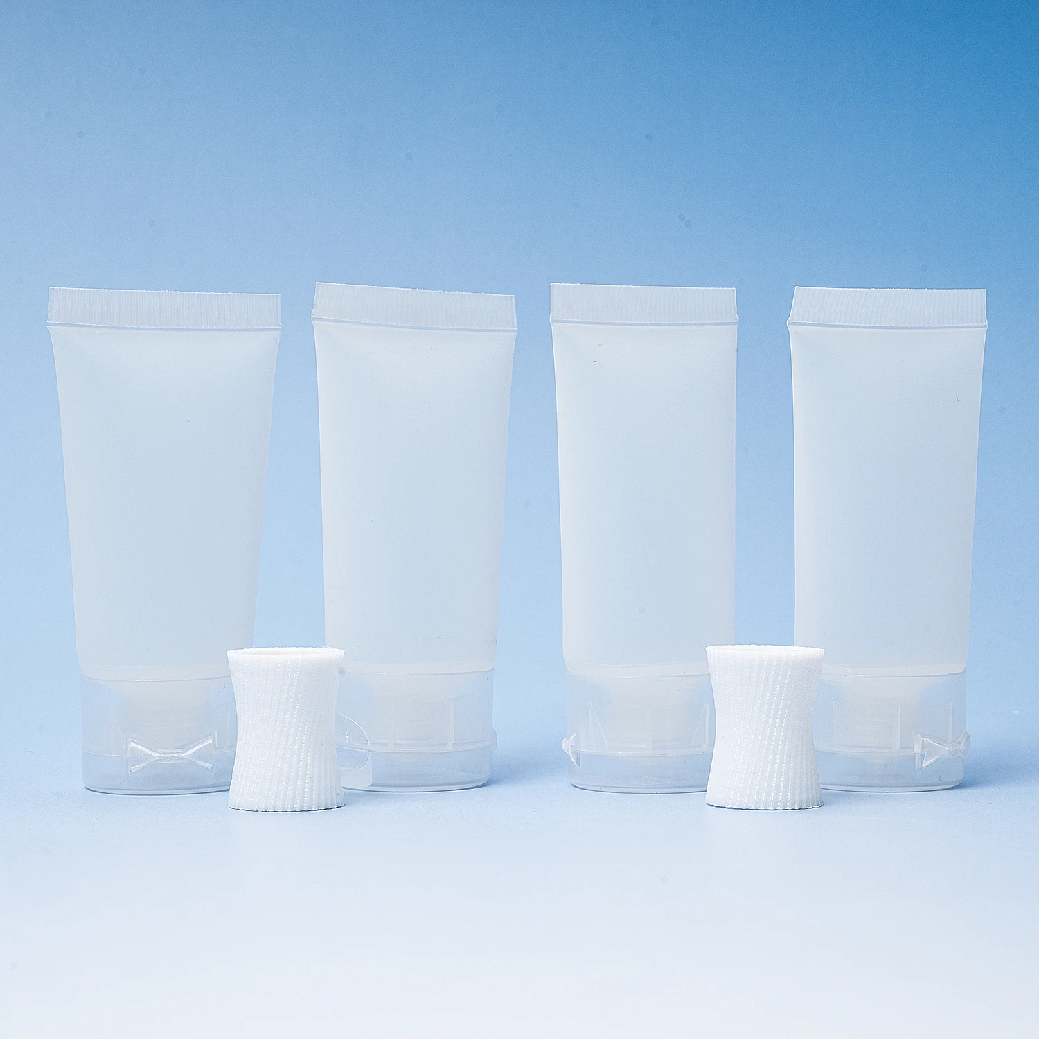 bouteilles à presser cosmétiques, dentifrice et lotion/crème avec accessoires de connexion ; ensemble de bouteilles rechargeables de voyage portables.