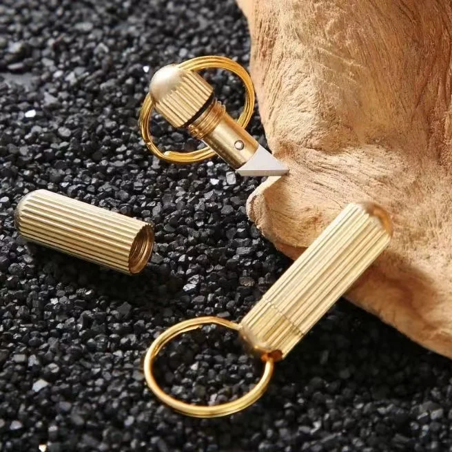 Ferramentas multifuncionais portáteis EDC Mini chaveiro ao ar livre Peel Fruits Keychain Forma de cápsula Faca de bronze Ferramentas de