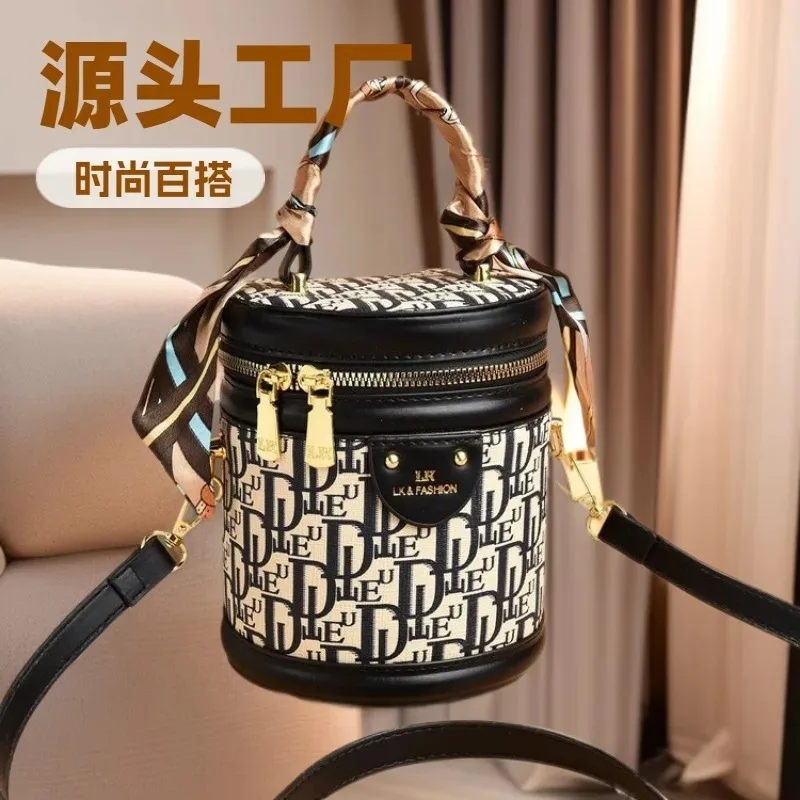 

New high-end silk scarf portable bucket women's bag niche retro messenger bag