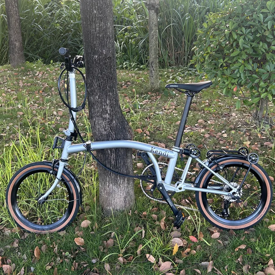 

KENDI Сверхлегкий 16-дюймовый 9-скоростной складной велосипед с рамой из углеродистой стали, алюминиевый сплав, тормоз C, портативный мини-городской велосипед для взрослых