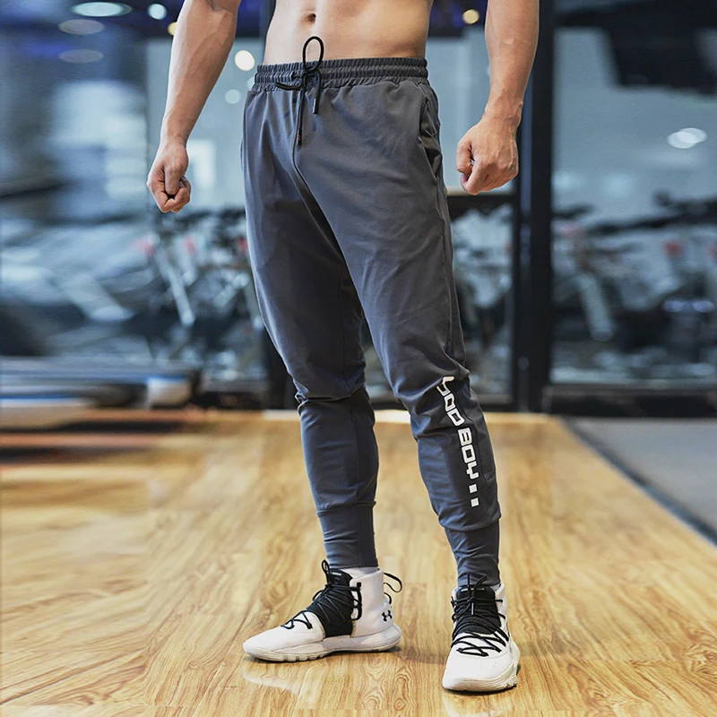 2023 New Sports And Leisure Trousers Elastic Quick-drying Slim-fit Pencil Pants Gym Long Pants Men Spring And Summer All-match