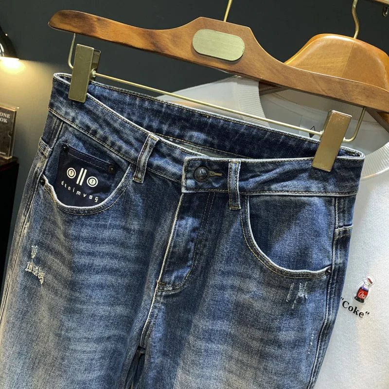Jeans larghi taglie forti da uomo, design a gamba dritta lavato retrò, pantaloni da uomo di nuova tendenza della moda autunnale 2025