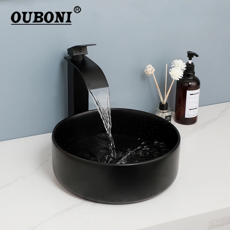 

OUBONI Bathroom Basin Faucet Set Round Ceramic Washbasins Waterfall Outlet Hot and Cold Mixer Taps Matte Black Pop Up Drain