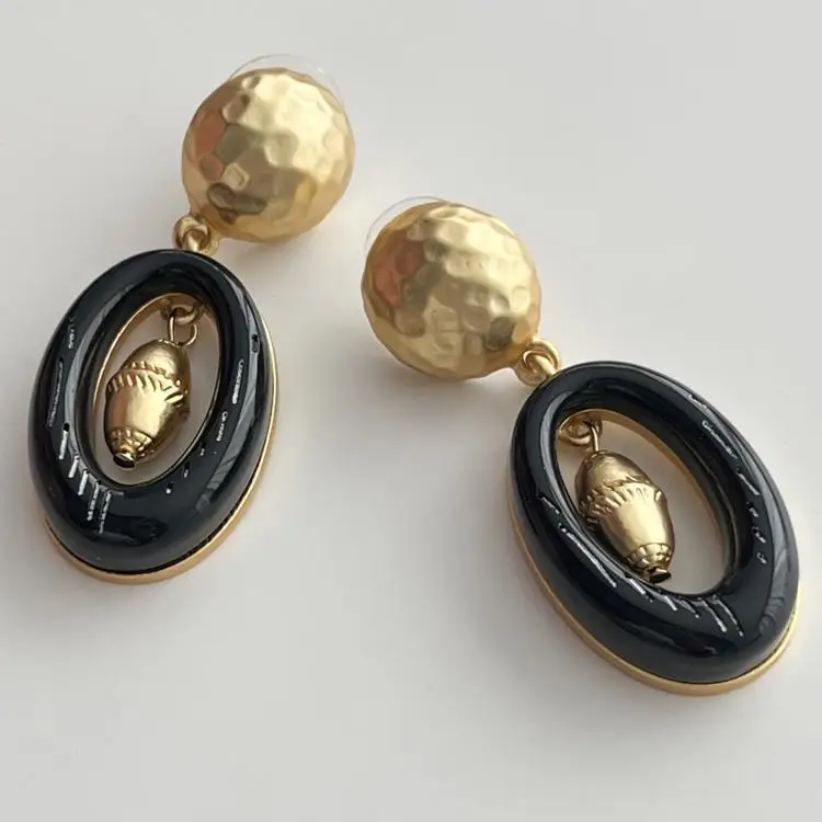 European and American hollowed out oval ring pit pattern dot earrings