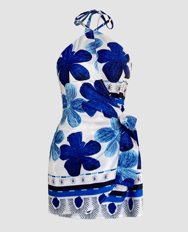 Monos cortos para mujer, novedad de verano, moda, estampado Floral, cuello Halter, lazo en la cintura, mameluco de una pieza con detalle de falda