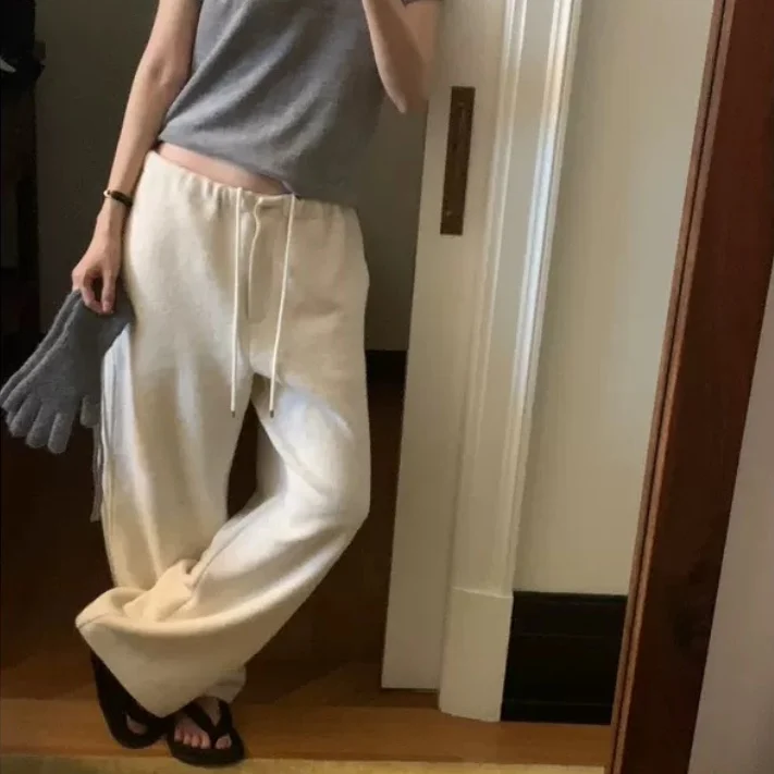 Luźne wełniane spodnie damskie z wysokim stanem i szerokimi nogawkami w stylu koreańskim, z elastyczną gumką w pasie i sznurkiem, długie spodnie wyszczuplające.
