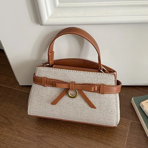 Women PU Leather Patchwork Handbag Trapezoid Box Tote Bowknot Decor Crossbody Bag Elegant Vintage Shoulder Purse 2026
