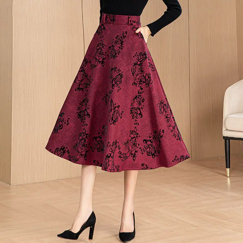 

2024 Autumn New Retro Fashion Print Women's Folded Pocket Loose High Waist Elastic A-line Elegant Versatile Mid Length Skirts
