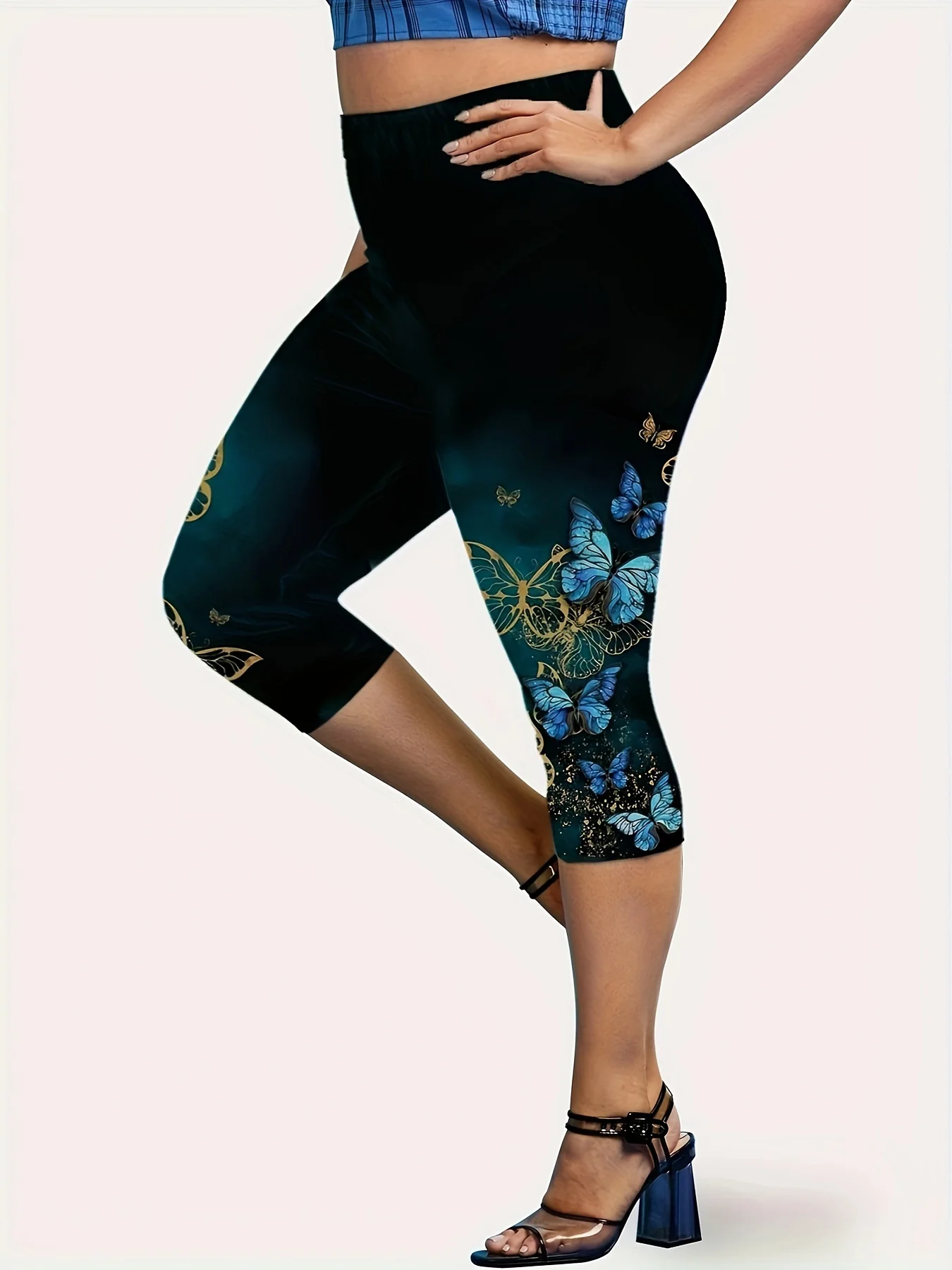 A two-piece set of casual and fashionable butterfly print pullover T-shirt and capri pants for Spring/Summer 2026