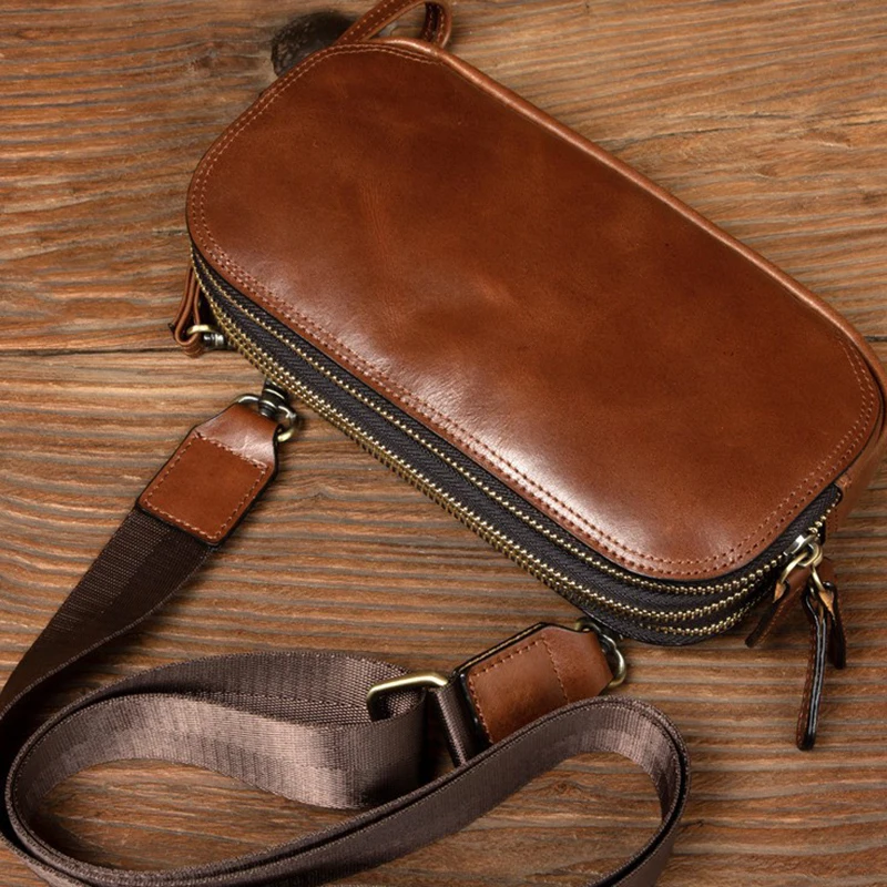

Men's Leather with Baotou Cowhide Slung Over One Shoulder Small Backpack Leisure Mobile Phone Change Bag